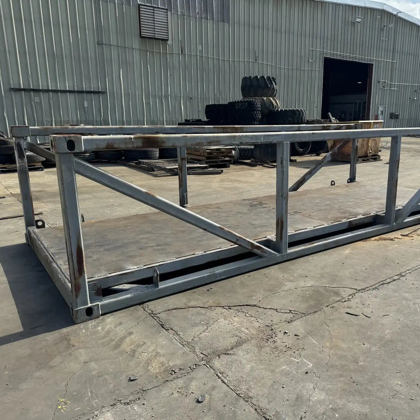 portable steel pedestrian bridge in an industrial lot