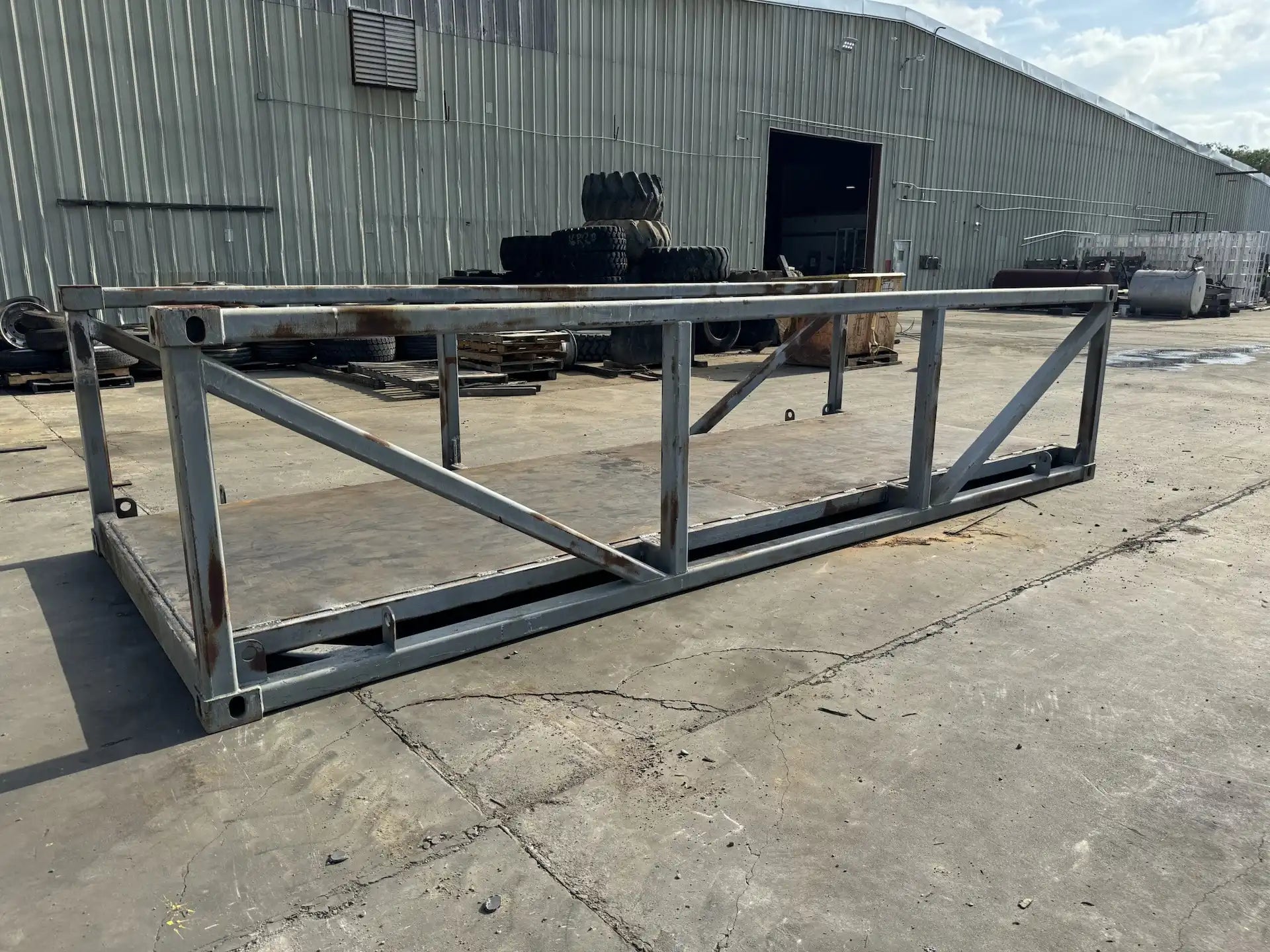 portable steel pedestrian bridge in an industrial lot
