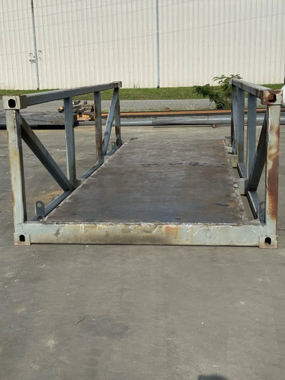 portable steel pedestrian bridge in an industrial lot