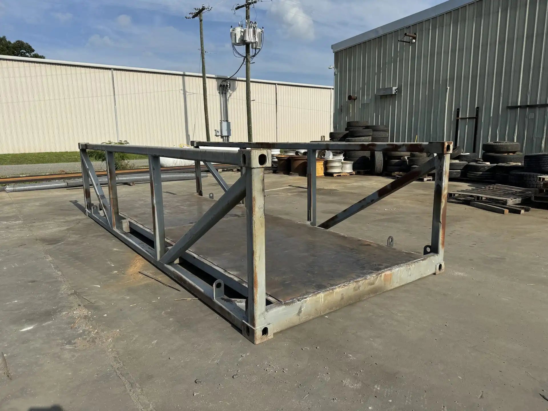 portable steel pedestrian bridge in an industrial lot