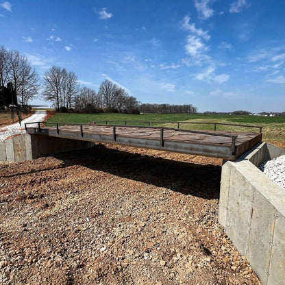 portable steel bridge in an agricultural area