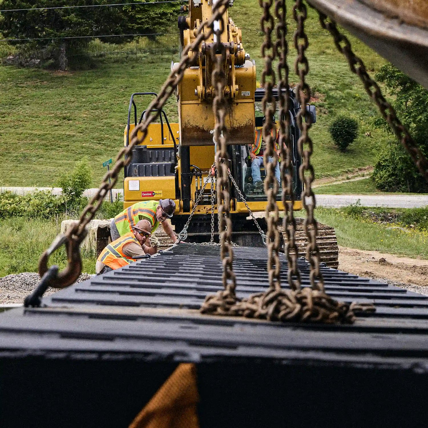 Chain rigging on a modular steel bridge deck during installation